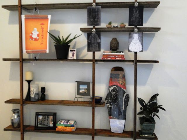 Floating wall shelves using reclaimed wood