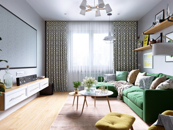 светлая комната с зеленым диваном